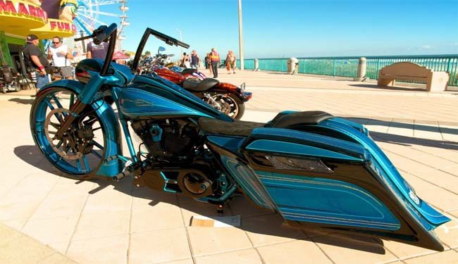 steel-blue-motorcycle-on-boardwalk